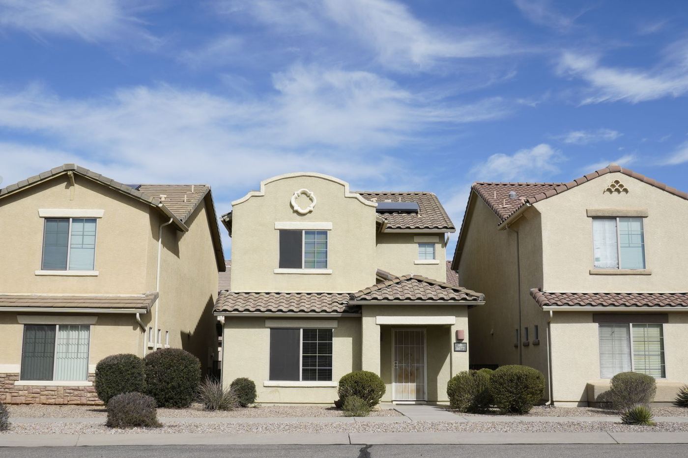 Stucco homes in the West Valley where King David Tree Care trims trees
